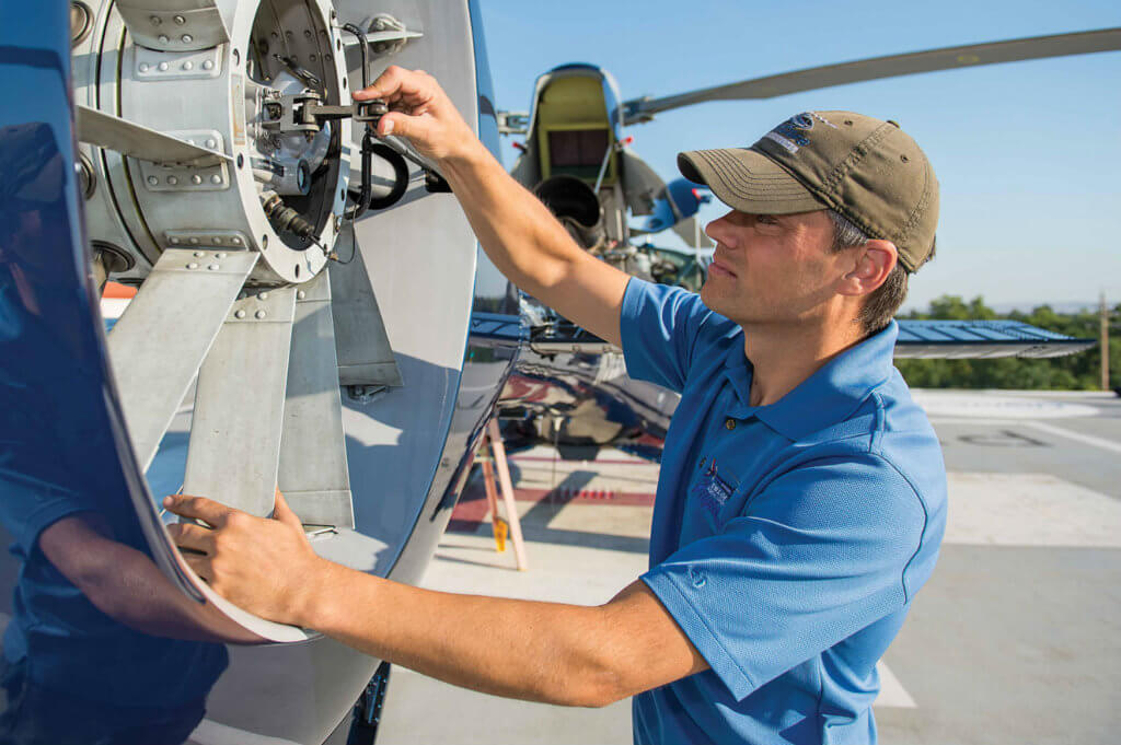 Mechanic working on aircraft